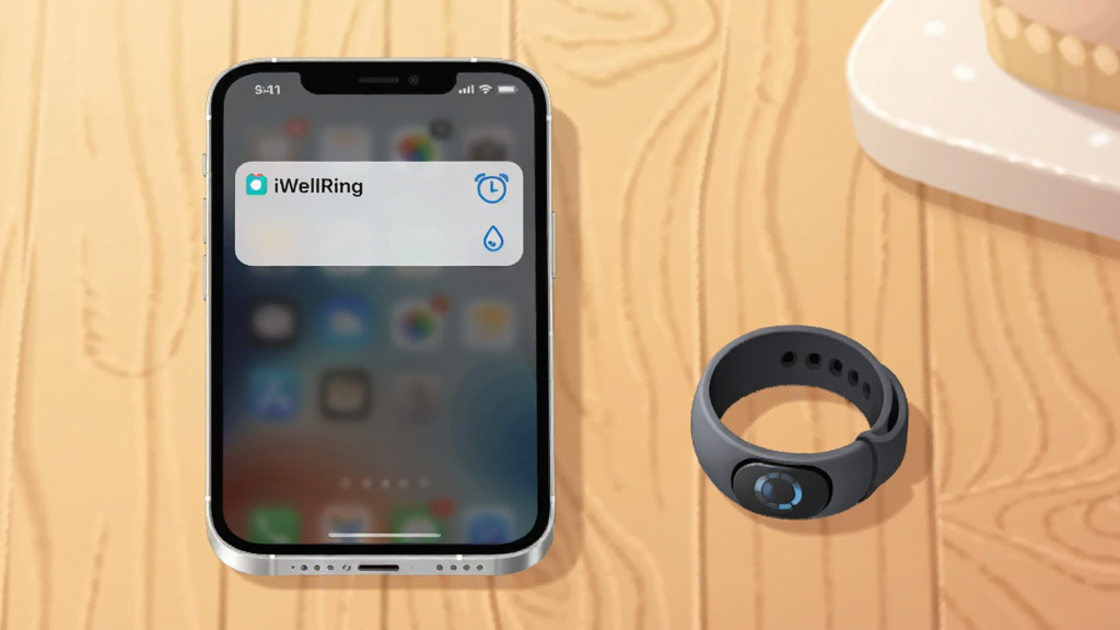 桌面场景中手机与智能指环并排摆放,手机屏幕弹出“iWellRing”通知卡片,卡片旁有闹钟与水滴图标,布局为水平排列,风格为简约生活化插画,细节包括桌面木纹质感与柔和光影,画质清晰,画面干净